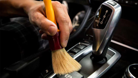 Person Using Boar’s Hair Car Detailing Brush By Chemical Guys