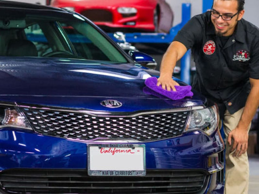 Glaze Being Applied to a Blue Car